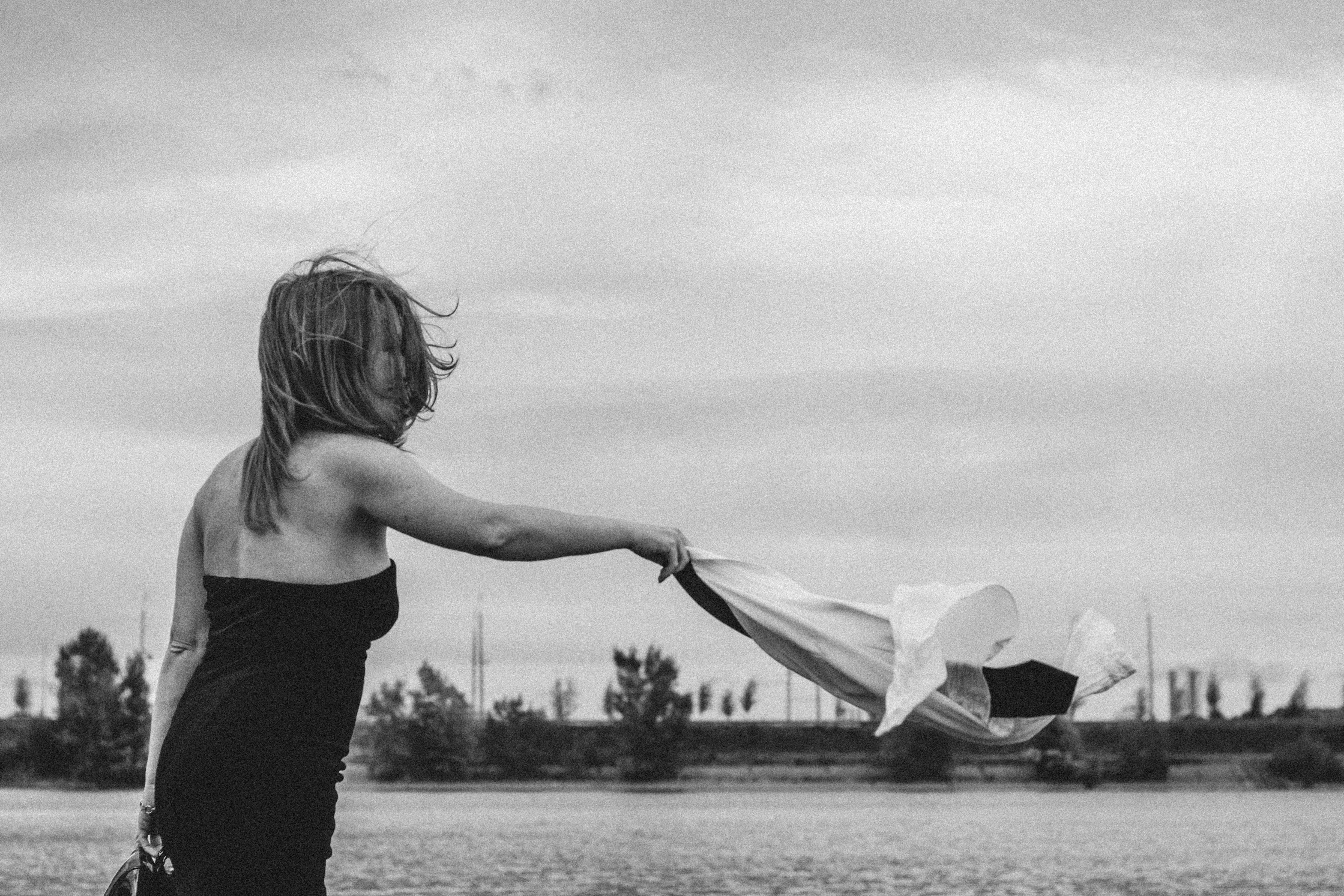 Woman holding white textile